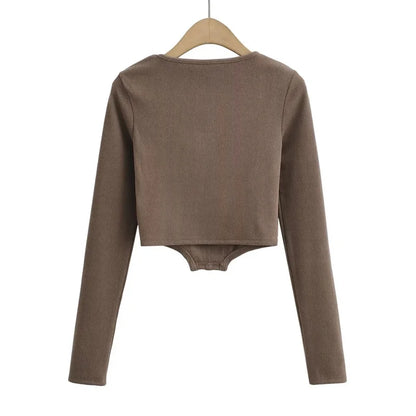 A stylish slim-fit short autumn top with an open waist design, made of premium polyester fabric with long sleeves and a square collar.
