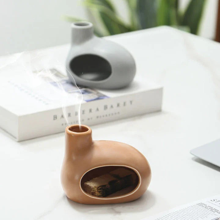 Elegant ceramic Palo Santo incense burner with a modern, conical design for optimal aroma release