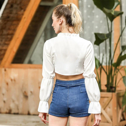 A stylish ruffled deep V-neck crop top with puff sleeves and a loose, flattering fit
