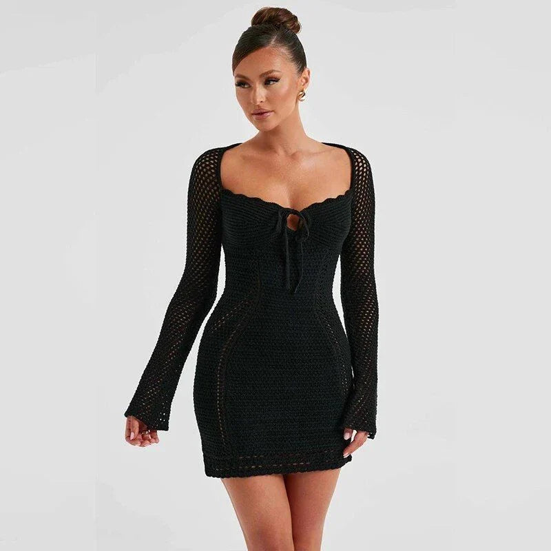 Strapless black knitted bodycon mini dress with chest wrapping and lace-up details