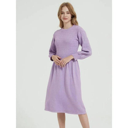 Elegant long sleeve knitted sweater dress in purple red with a classic A-line silhouette and mid-calf length