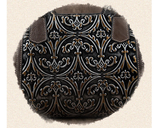 A fashionable large capacity leather shoulder bag for women in a vintage-inspired floral design with multiple interior pockets for organization.