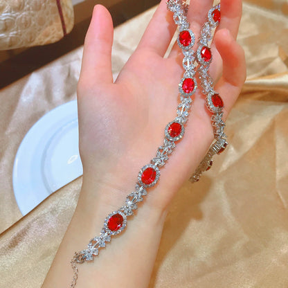 Luxury Imitation Ruby Dove Egg Necklace with Full Diamonds - Captivating pendant, dazzling diamonds, and luxurious imitation ruby for elegant style.