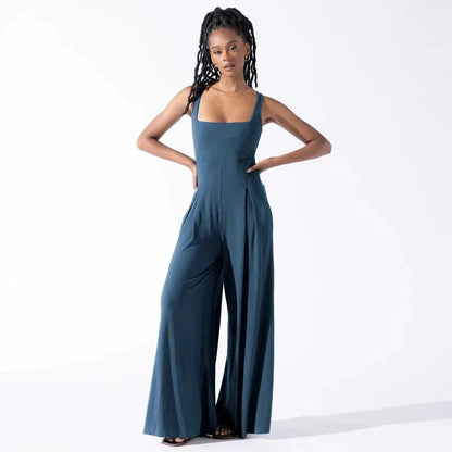 Chic sleeveless jumpsuit with wide-leg pants, made with Rayon and Spandex for comfort and breathability.