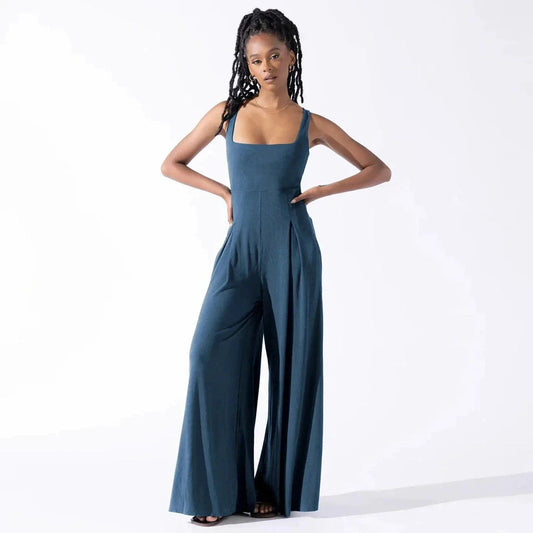 Chic sleeveless jumpsuit with wide-leg pants, made with Rayon and Spandex for comfort and breathability.