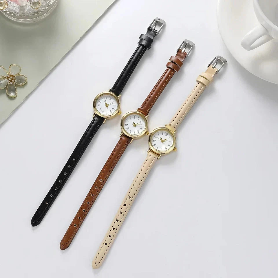 Elegant women's quartz leather wristwatch with a minimalist, timeless design