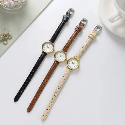 Elegant women's quartz leather wristwatch with a minimalist, timeless design