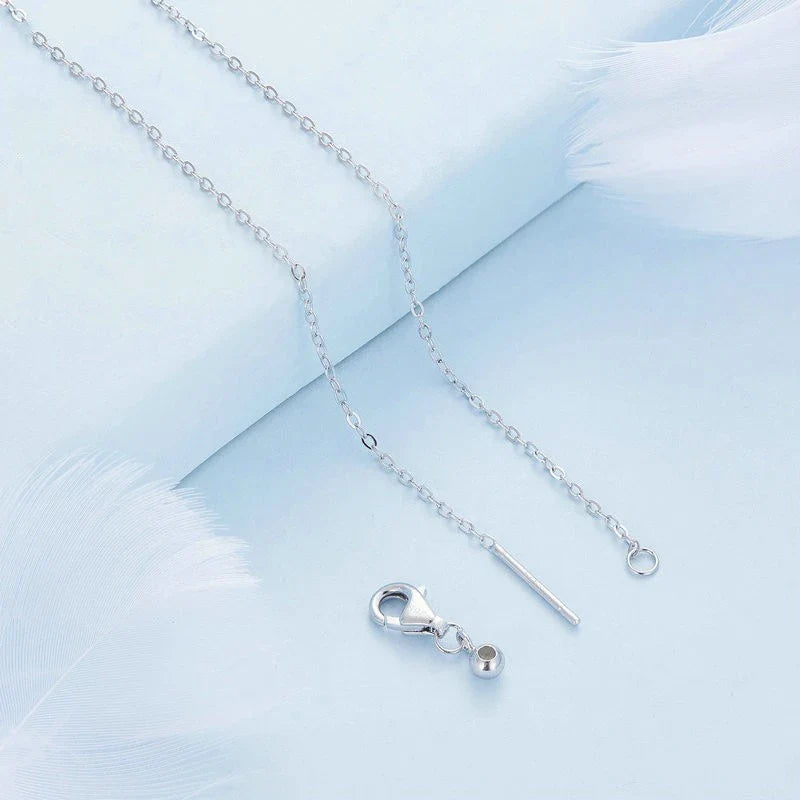 Elegant platinum-plated adjustable green pendant necklace with a sleek, silver-toned chain and a stylish green pendant