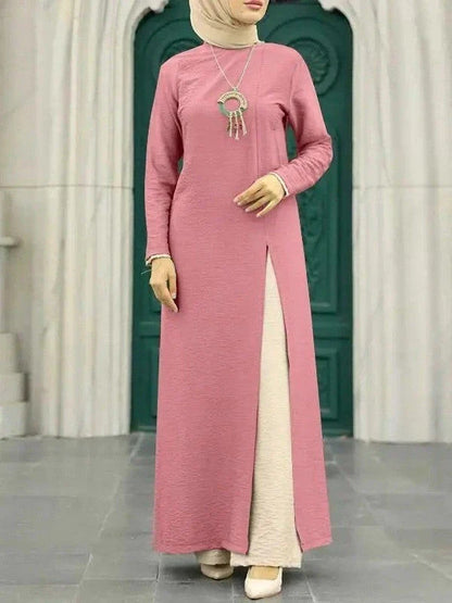 Elegant polyester dress with long sleeves, high slit hem, and available in caramel, black, blue, green, and pink colors