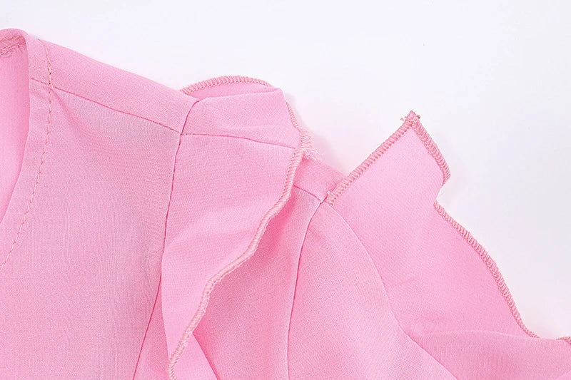 Cute heart-shaped bow tie blouse for girls in pink with ruffled v-neck and slim fit