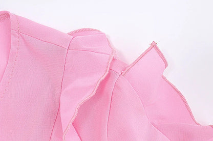 Cute heart-shaped bow tie blouse for girls in pink with ruffled v-neck and slim fit