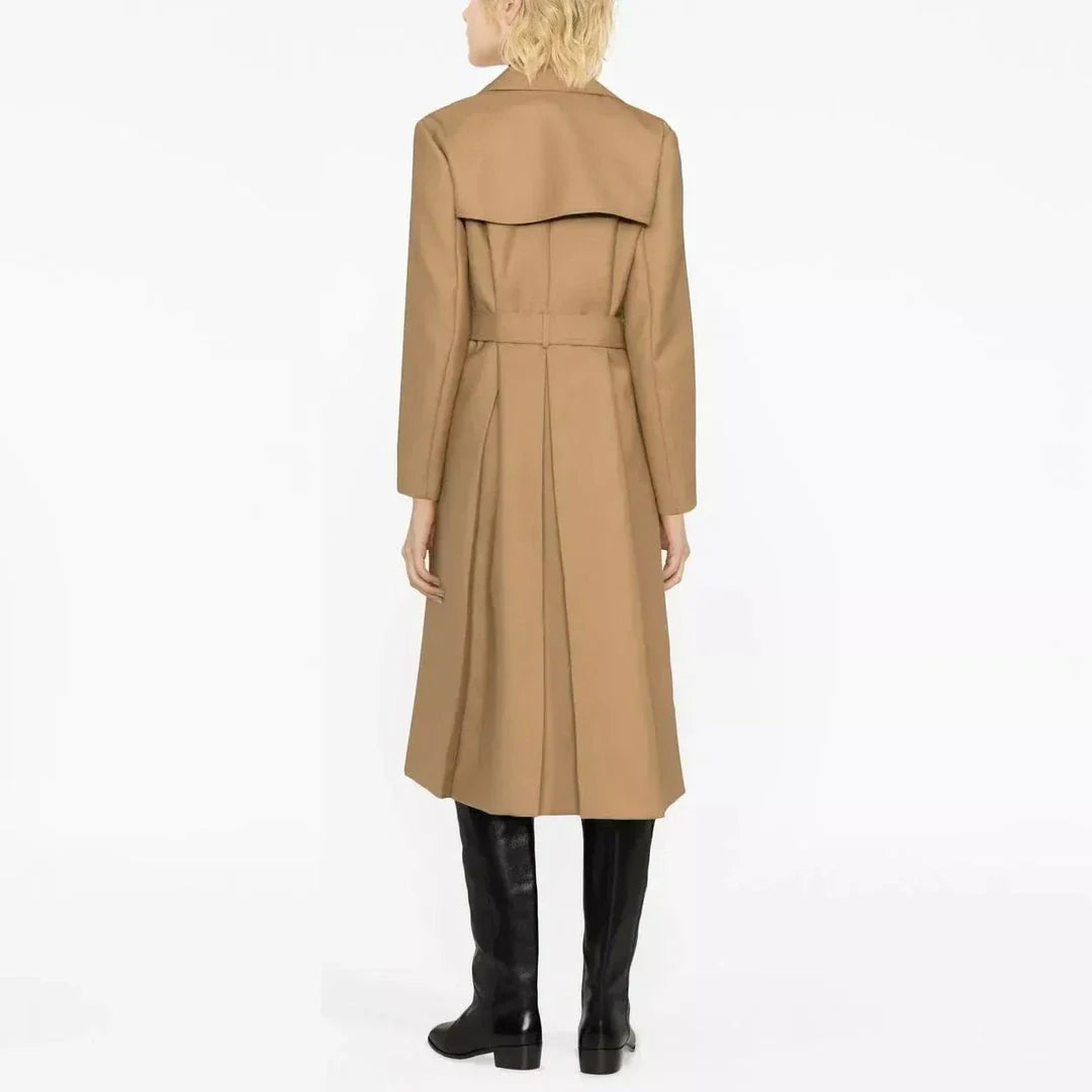 Elegant double-breasted women's trench coat in beige color with sash and pockets for a timeless, versatile style
