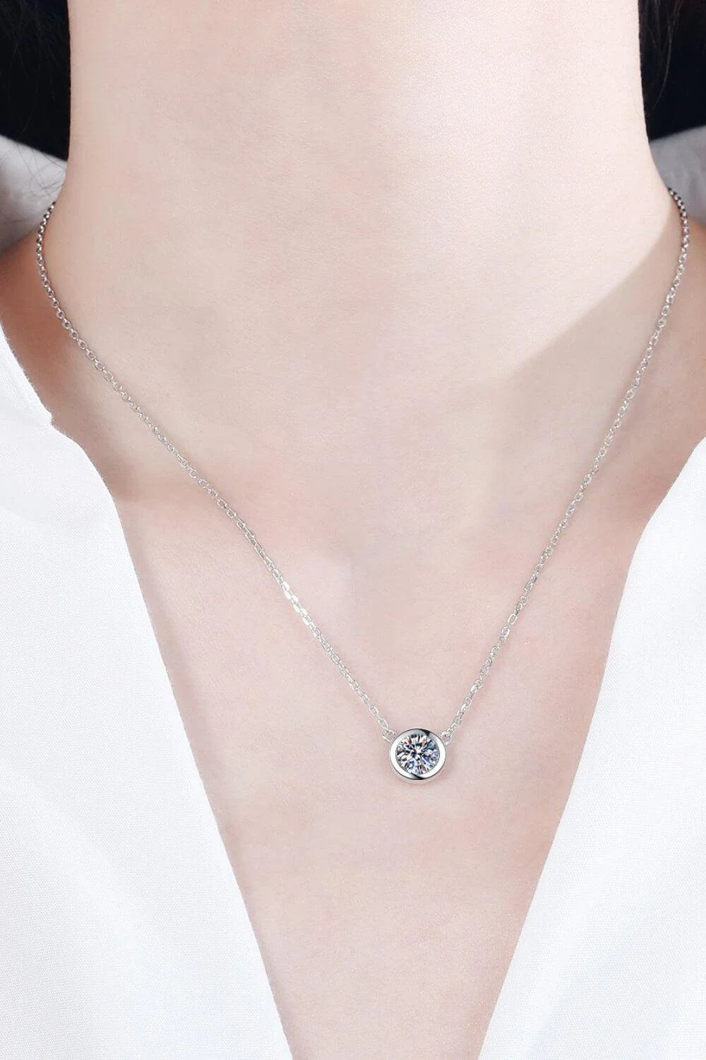 Sterling silver moissanite pendant necklace with adjustable chain and sparkling 1-carat center stone
