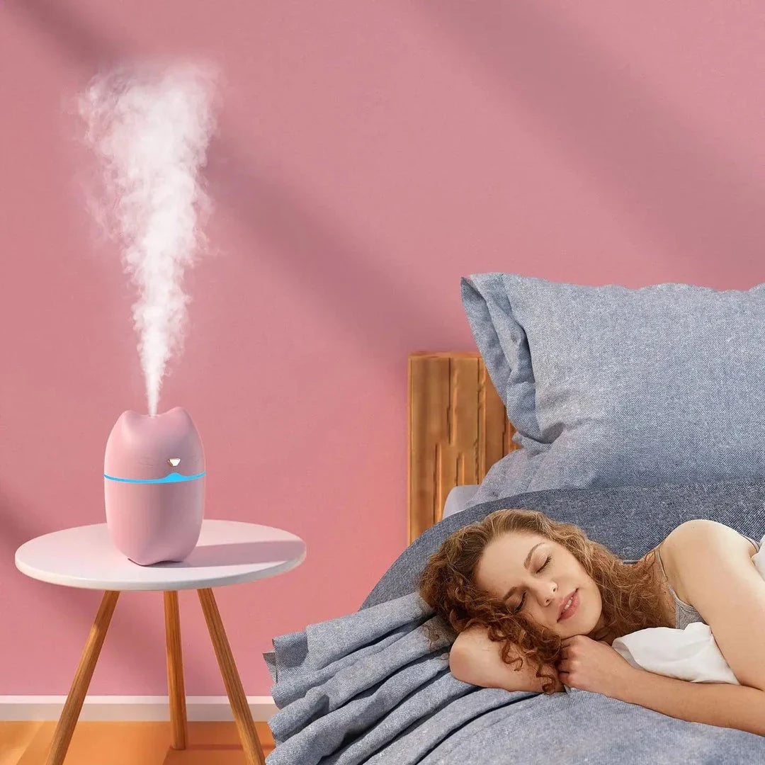 Compact and ultra-quiet car humidifier with large 260ml water tank, efficient mist output, and aromatherapy function for a serene driving experience