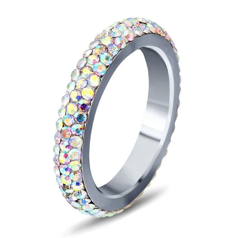 A personalized couple's ring made of stainless steel and adorned with sparkling rhinestones, symbolizing the beauty of your love story.
