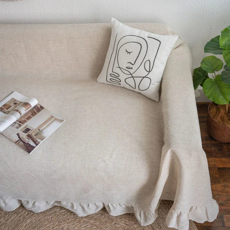 Elegant ruffled sofa cover in a variety of solid colors, offering a timeless American style for any living room