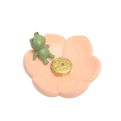 Elegant mini resin incense holder with cherry blossom, water lily, plum blossom, and daisy motifs for calming aromatherapy experience
