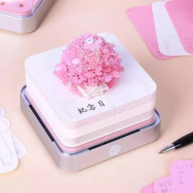 2024 Calendar Memo Pad with 3D paper art designs, including a Romantic Cherry Blossom Tree with Lights, used as a desk calendar, notepad, and decorative sculpture
