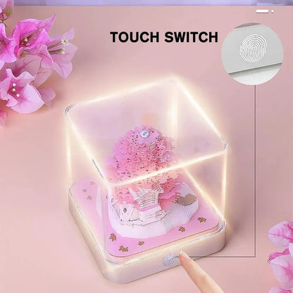 2024 Calendar Memo Pad with 3D paper art designs, including a Romantic Cherry Blossom Tree with Lights, used as a desk calendar, notepad, and decorative sculpture