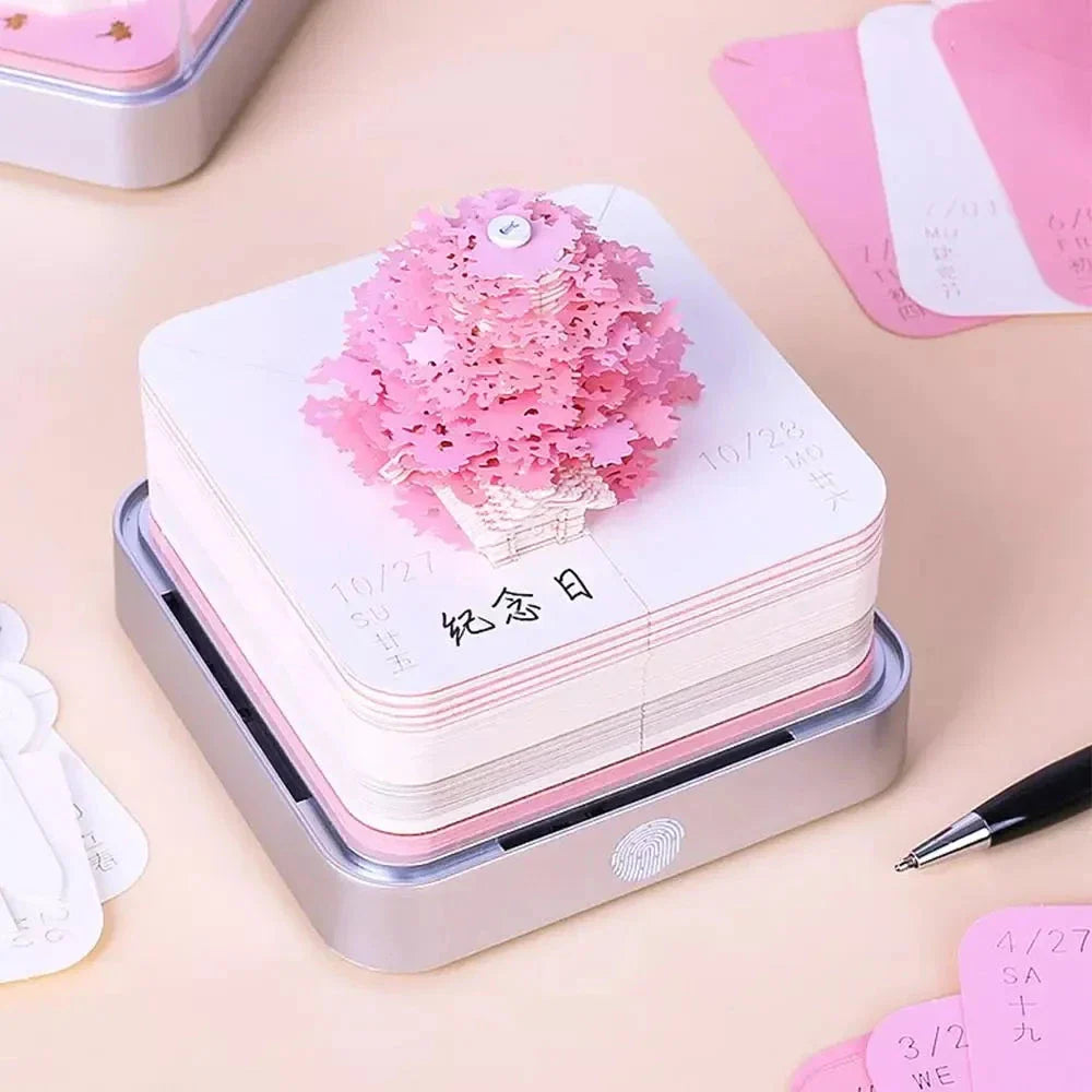 2024 Calendar Memo Pad with 3D paper art designs, including a Romantic Cherry Blossom Tree with Lights, used as a desk calendar, notepad, and decorative sculpture