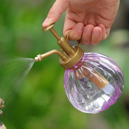 Elegant vintage garden spray bottle with a durable, clear construction and a ring finger bracket for comfortable use