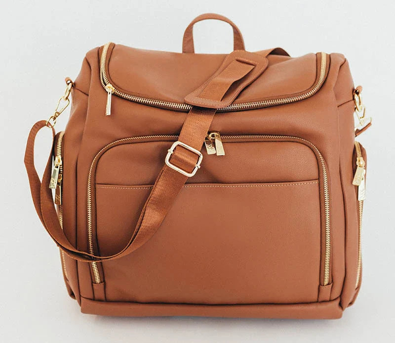 Multifunctional baby bag with large capacity, made of durable PU leather and featuring multiple pockets for storage