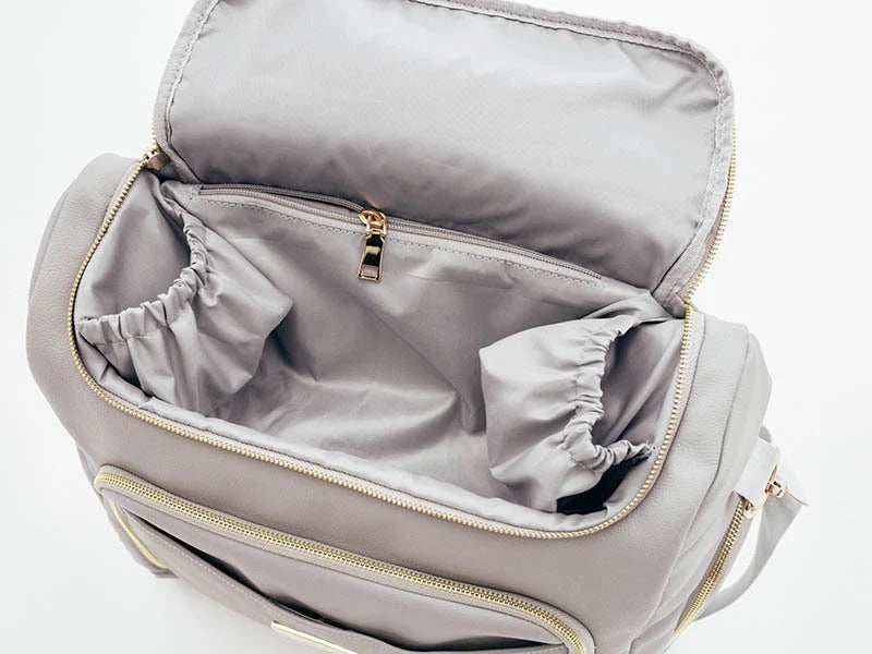 Multifunctional baby bag with large capacity, made of durable PU leather and featuring multiple pockets for storage