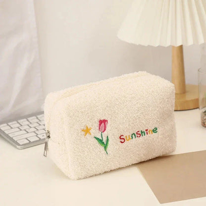 Cute Embroidered Flowers Cosmetic Bag in Ivory Color with Plush Material and Secure Zipper Closure