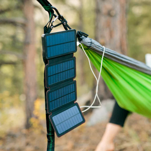 Portable solar powered charger panel with foldable design and high-capacity 8000 mAh battery for outdoor adventures