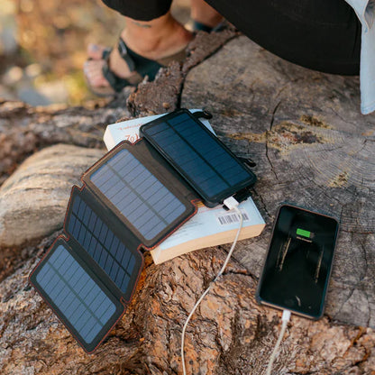 Portable solar powered charger panel with foldable design and high-capacity 8000 mAh battery for outdoor adventures
