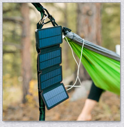 Portable solar powered charger panel with foldable design and high-capacity 8000 mAh battery for outdoor adventures