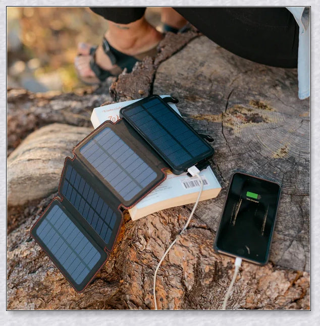 Portable solar powered charger panel with foldable design and high-capacity 8000 mAh battery for outdoor adventures