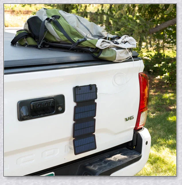 Portable solar powered charger panel with foldable design and high-capacity 8000 mAh battery for outdoor adventures