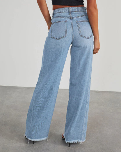 A pair of high-waisted jeans with pockets, designed for a comfortable and stylish fit.
