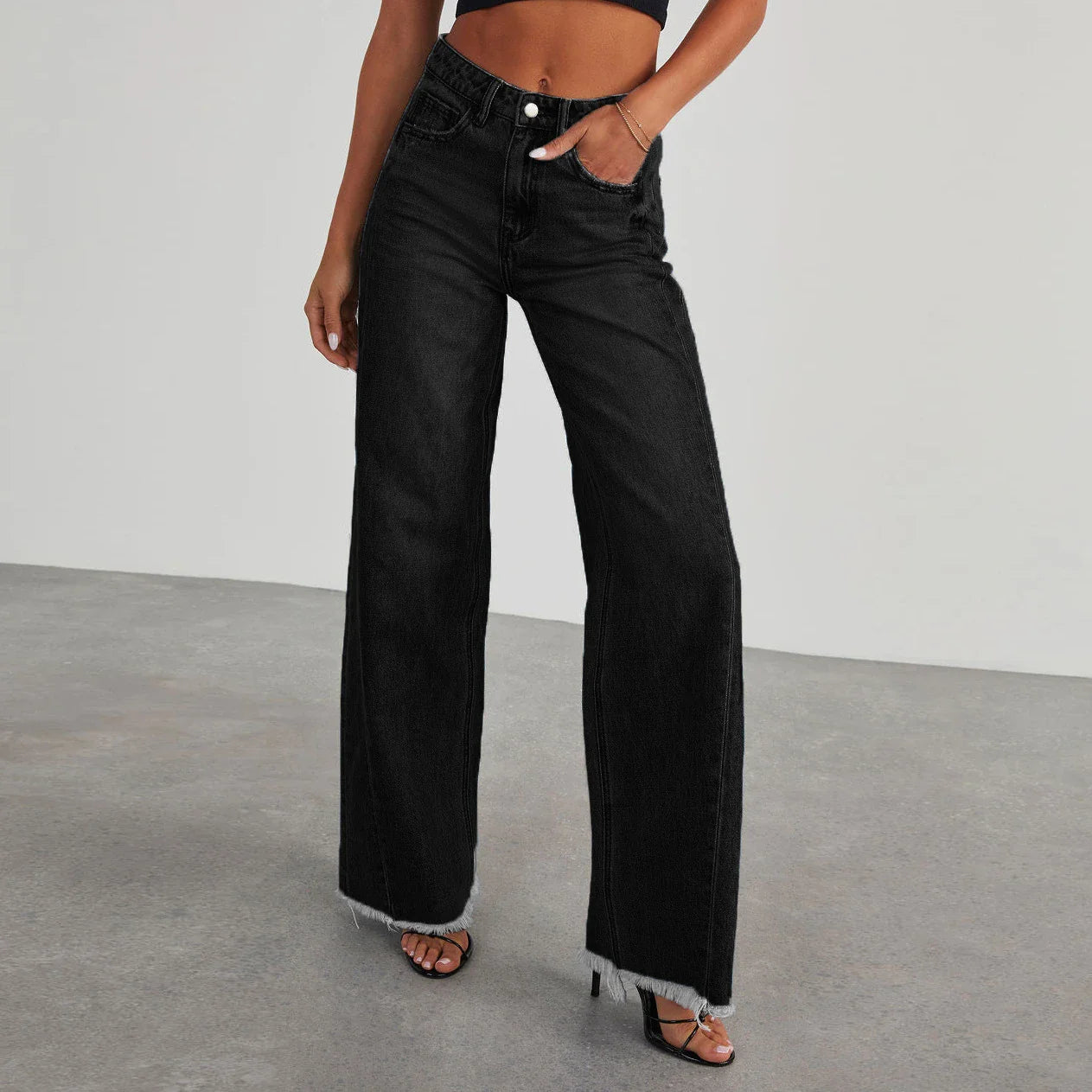 A pair of high-waisted jeans with pockets, designed for a comfortable and stylish fit.