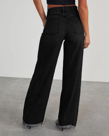 A pair of high-waisted jeans with pockets, designed for a comfortable and stylish fit.