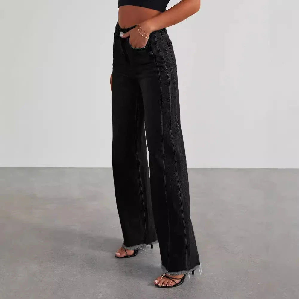 A pair of high-waisted jeans with pockets, designed for a comfortable and stylish fit.