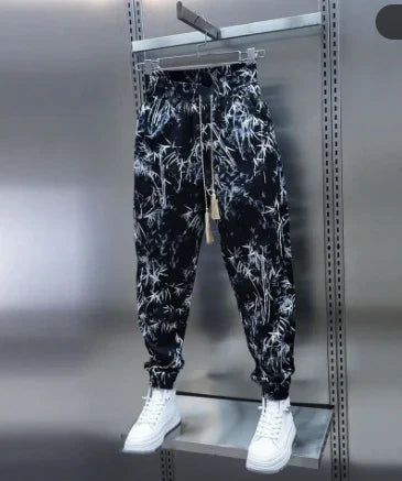 Loose, breathable men's harem pants in a floral print design for comfortable summer style