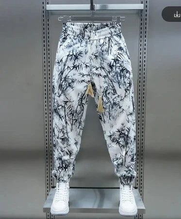 Loose, breathable men's harem pants in a floral print design for comfortable summer style