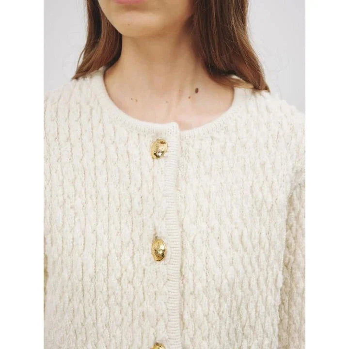 Elegant knitted cardigan for women in premium wool fabric, featuring O-neck collar and convenient pockets