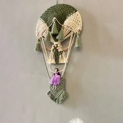 Handcrafted cotton tapestry featuring vibrant hot air balloon design, perfect for wall decor in living room or bedroom.