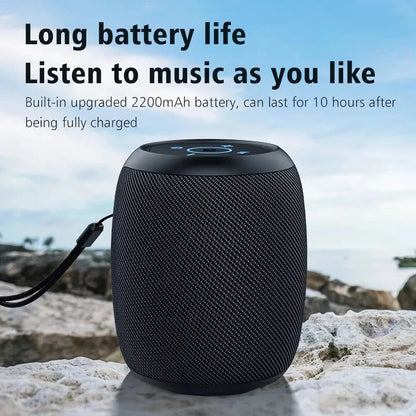 Portable waterproof Bluetooth speaker with powerful 10W sound, metal diaphragm, and colorful lighting effects