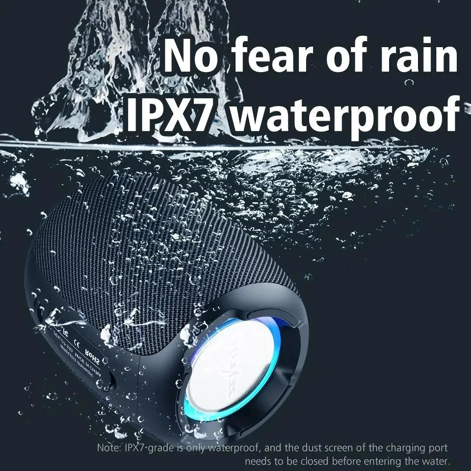 Portable waterproof Bluetooth speaker with powerful 10W sound, metal diaphragm, and colorful lighting effects