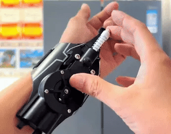 A high-quality 3D printed Spider Web Shooter toy with rechargeable battery and effective shooting range up to 9.8 feet, perfect for superhero roleplay and active fun.