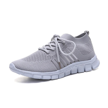 Breathable woven mesh shoes with a stylish cross-strap design and flexible rubber soles for all-day comfort and support.
