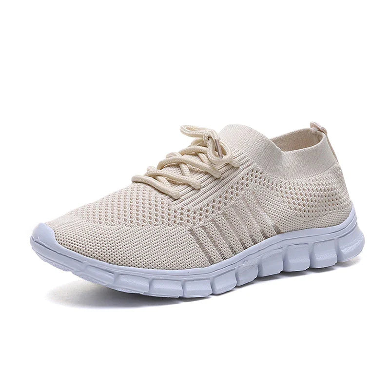 Breathable woven mesh shoes with a stylish cross-strap design and flexible rubber soles for all-day comfort and support.