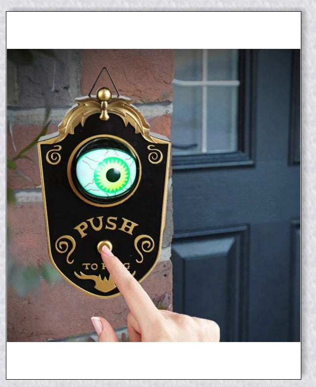 A black, retro-style doorbell with a glowing, moving eyeball that delivers spooky greetings for Halloween and other occasions