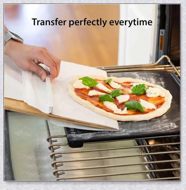 A high-quality pizza transfer shovel with a non-stick surface and sturdy construction for easy and mess-free pizza transfer from oven to plate.