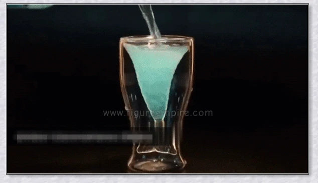 Transparent glass mug with a mermaid tail design, available in blue, green, pink, and yellow colors