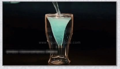 Transparent glass mug with a mermaid tail design, available in blue, green, pink, and yellow colors